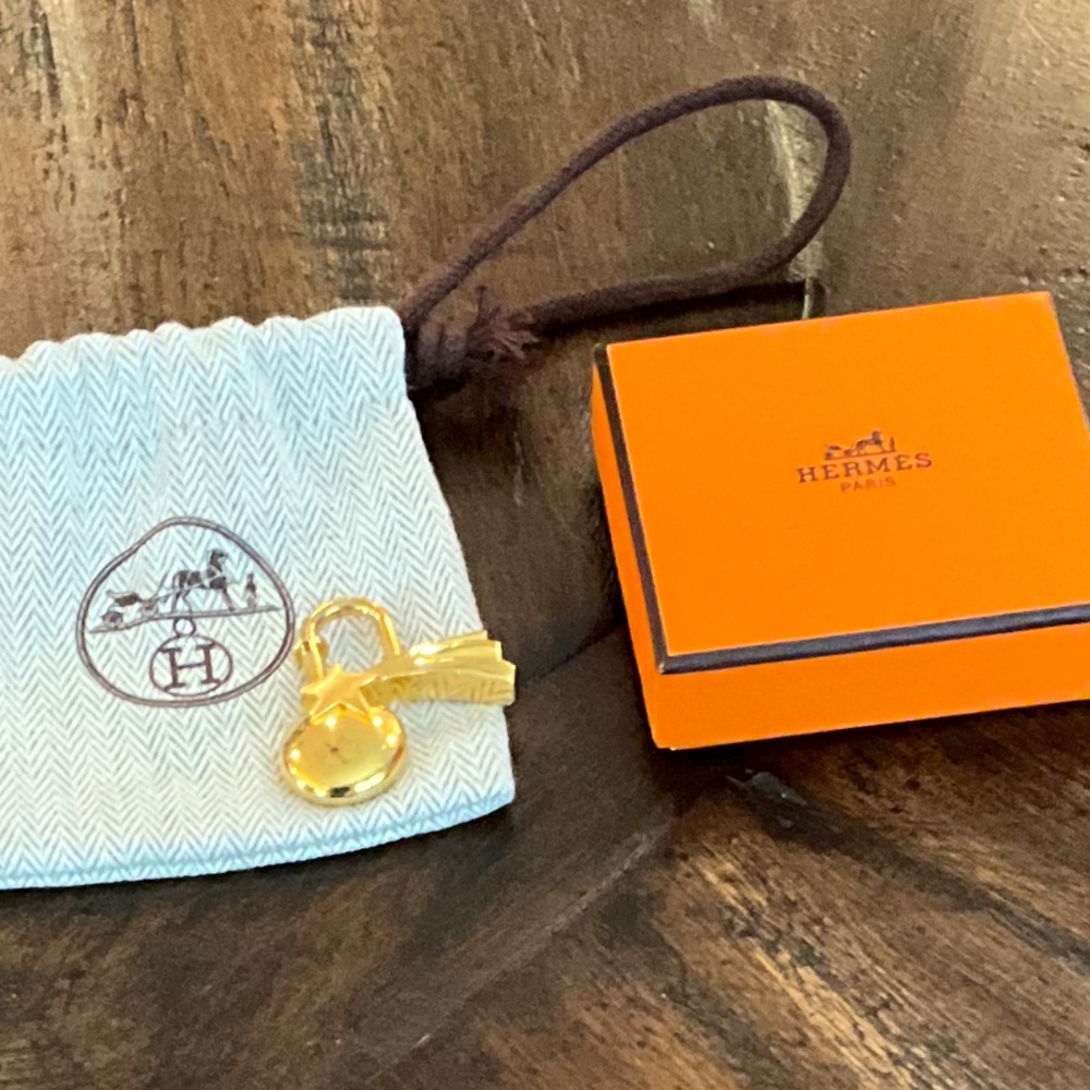 Hermes 1999 gold cadena lock charm